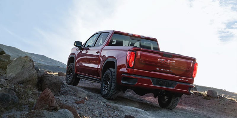 Red 2022 GMC Sierra Denali Ultimate in the desert