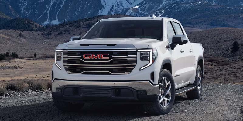 White 2023 GMC Sierra 1500 in mountains